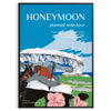 A romantic travel poster featuring a couple on a honeymoon, with blue and black tones. - in a black frame