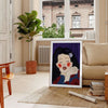Abstract human figures in bold black and brown hues, maximalist style - in a Parisian living room with a sofa and a fig plant