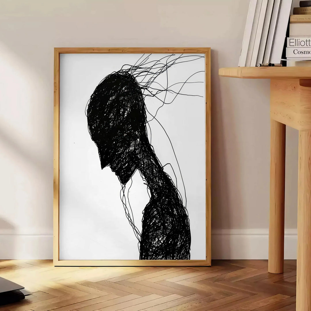 Abstract human figure in bohemian style with gray and black tones - beside a round wooden side table with books
