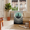 Dynamic silhouette of a human jumping against a black and gray background - in a Parisian living room with a sofa and a fig plant