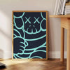 Abstract design featuring bold black and blue shapes with dynamic energy - beside a round wooden side table with books