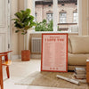 Abstract design featuring the phrase 'I Love You' in soft gray and brown tones - in a Parisian living room with a sofa and a fig plant