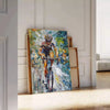 Impressionist landscape with lush greens and tranquil blues - leaning on a herringbone floor against a white panelled wall