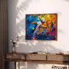 Impressionist landscape with orange and blue hues depicting a serene scene - styled on a counter with eucalyptus and a bowl of lemons