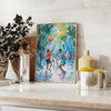Impressionist landscape with lush greens and blues - styled on a counter with eucalyptus and a bowl of lemons