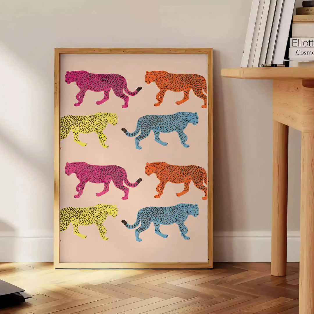 A jaguar illustrated in bold orange and gray tones against a textured background - beside a round wooden side table with books