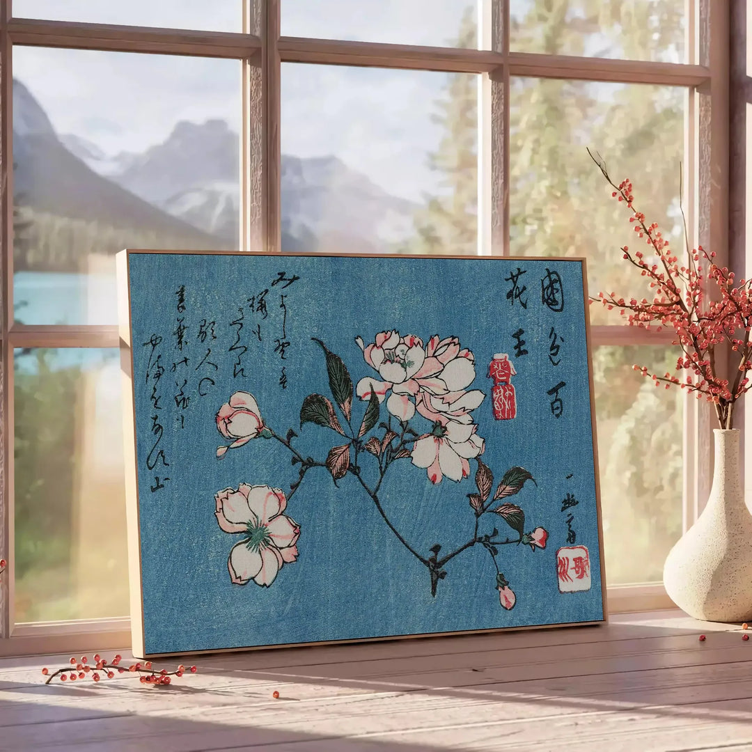 Abstract representation of Japan with bold black and orange colors - beside a round wooden side table with books