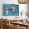 Abstract representation of Japan with bold black and orange colors - in a Parisian living room with a sofa and a fig plant