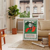 Colorful abstract representation of Japan with orange and blue hues - in a Parisian living room with a sofa and a fig plant