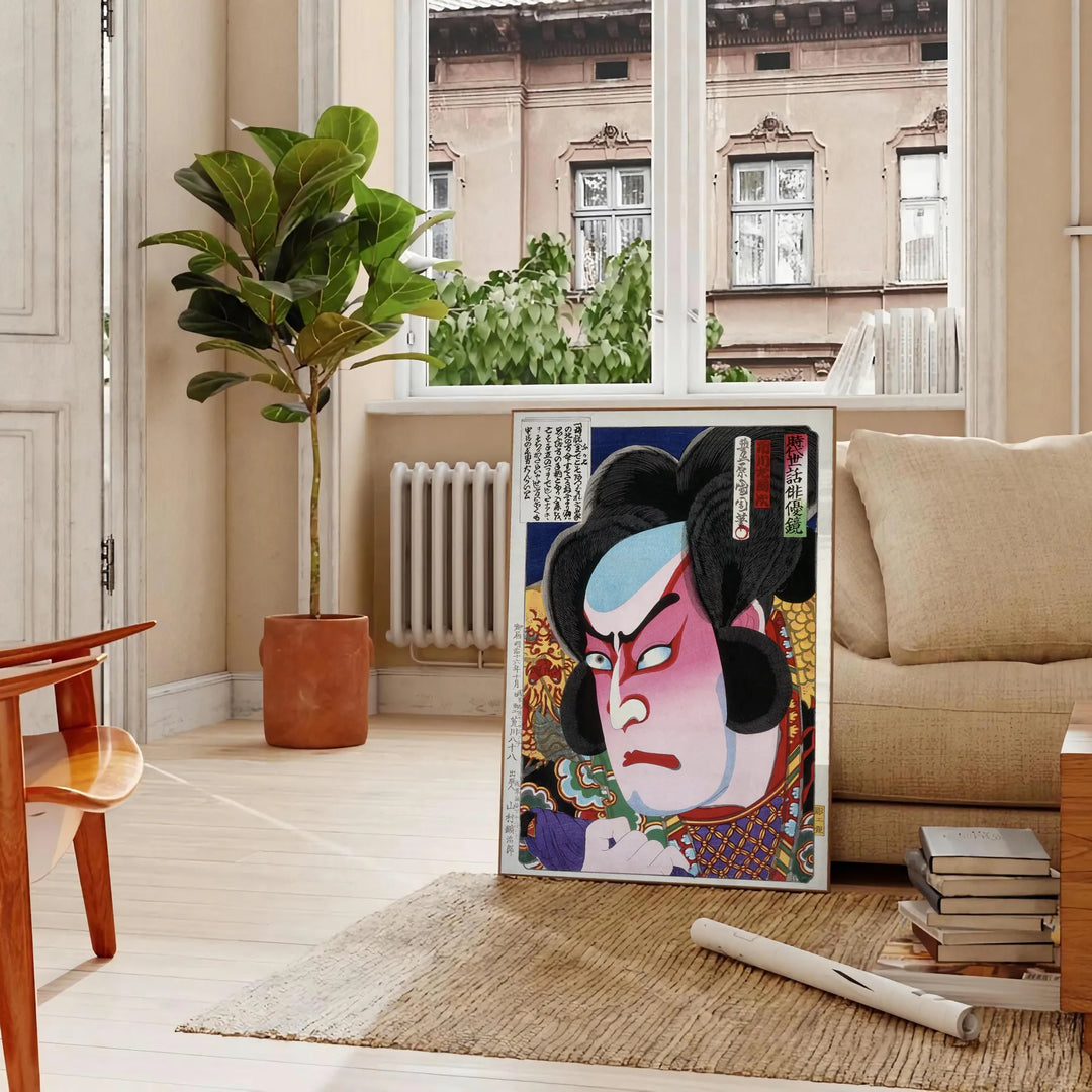 Traditional Japanese print featuring intricate designs in black and orange hues - in a Parisian living room with a sofa and a fig plant