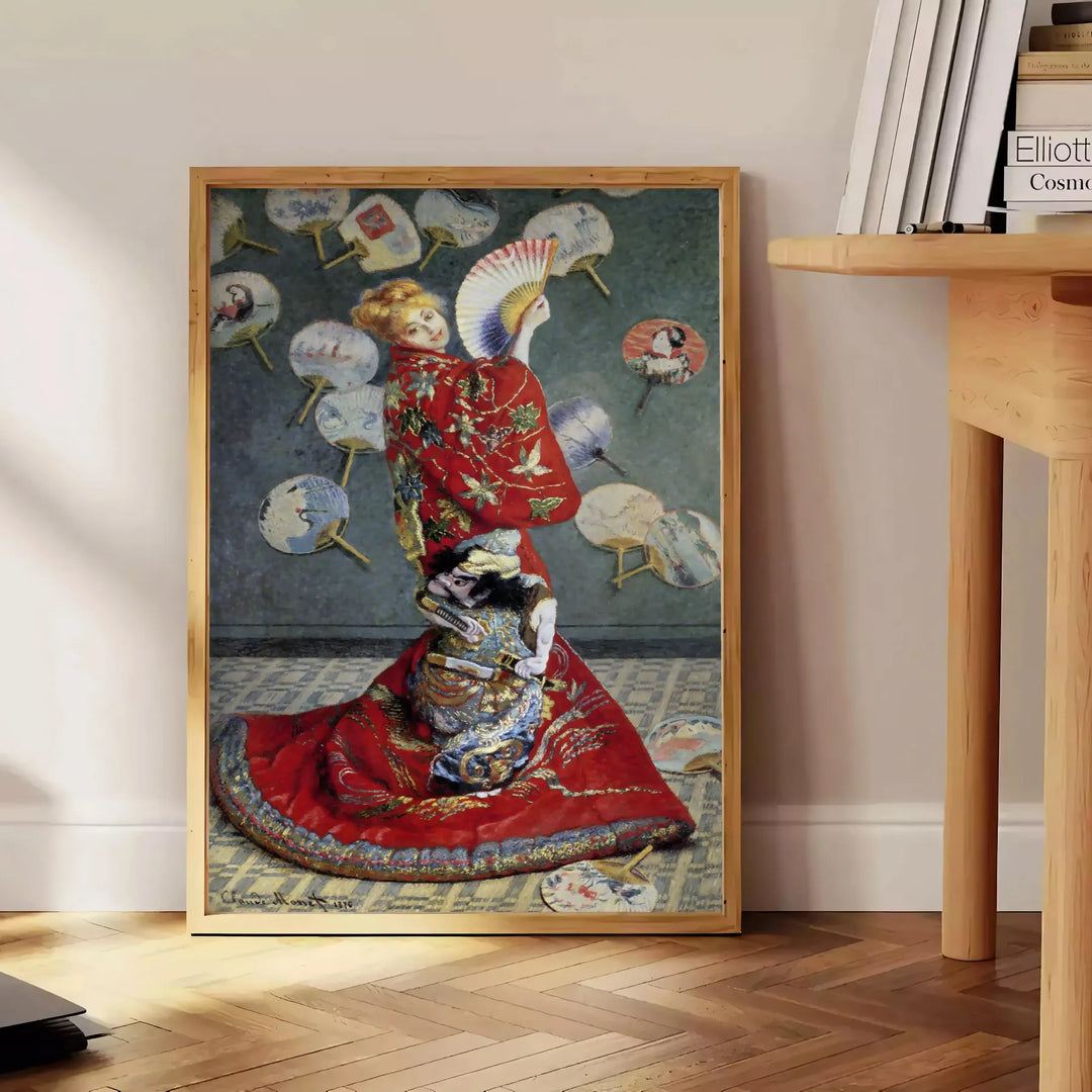 Japanese traditional art featuring serene landscapes in muted gray and green tones - beside a round wooden side table with books