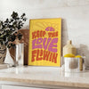Retro-style illustration with flowing text in yellow and green hues - styled on a counter with eucalyptus and a bowl of lemons