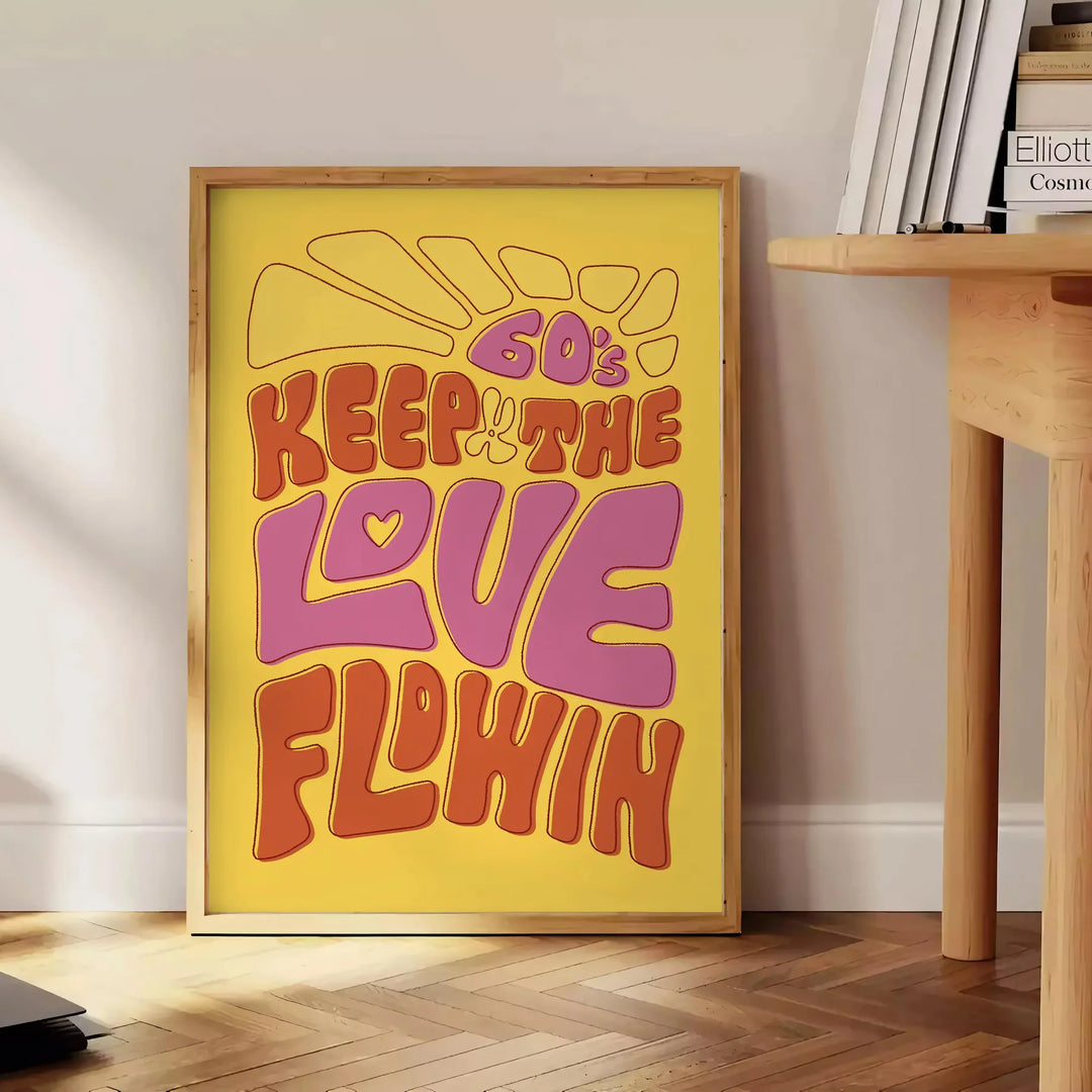 Retro-style illustration with flowing text in yellow and green hues - beside a round wooden side table with books