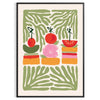 A colorful kitchen print featuring shades of green and orange - in a black frame