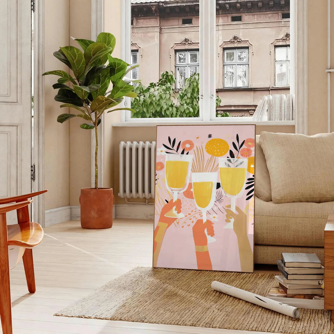 En modern kökscen i svarta och orange toner med kulinariska inslag - i ett parisiskt vardagsrum med soffa och en fikus
