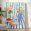 A colorful kitchen scene featuring orange and blue hues in a modern style - in a bright minimalist room with a plant and an armchair
