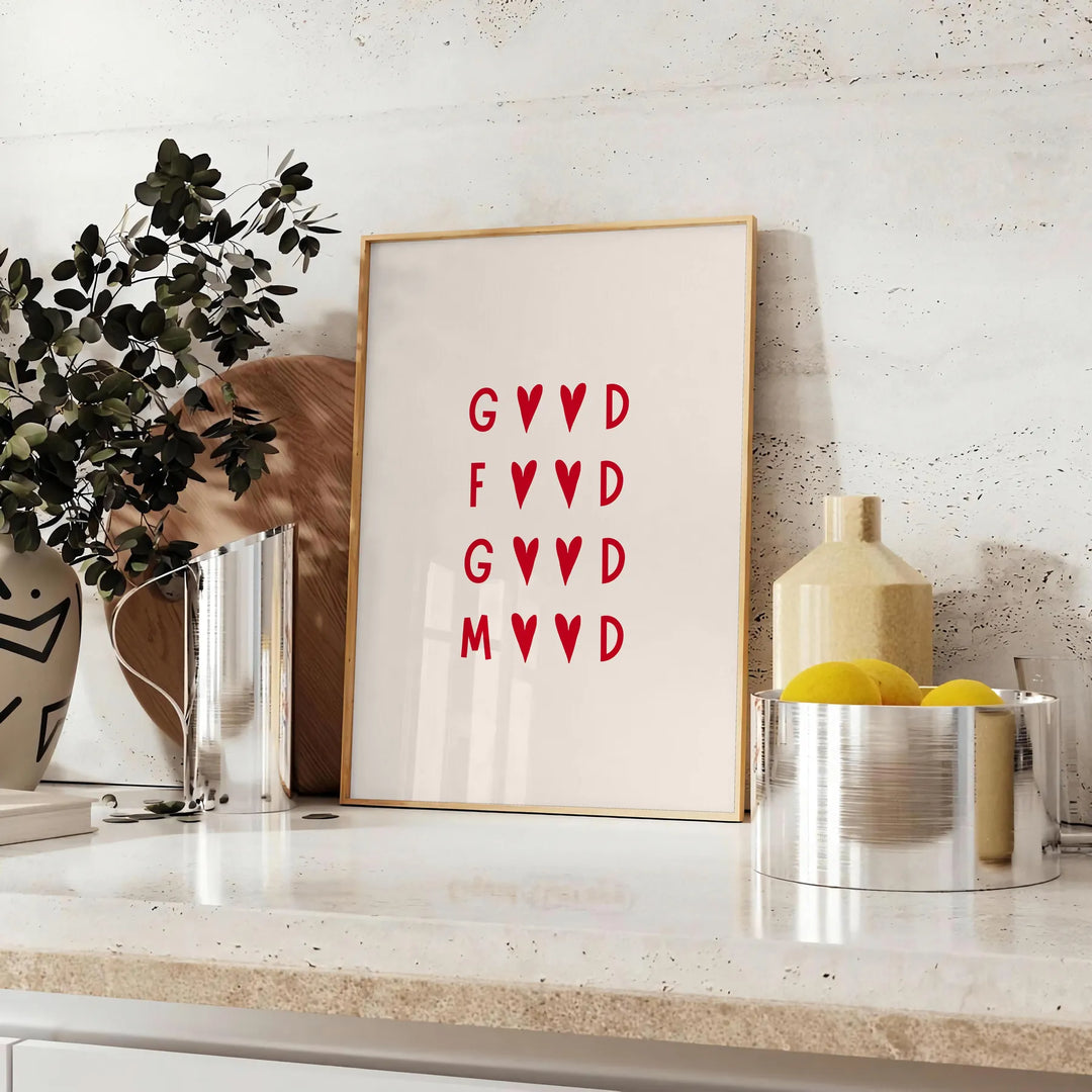 A modern kitchen scene with gray tones and red accents - styled on a counter with eucalyptus and a bowl of lemons