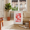 Retro 1970s kitchen scene with green and orange colors - in a Parisian living room with a sofa and a fig plant