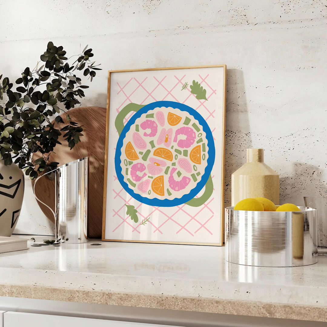 Illustration av ett kök med gröna och blå nyanser, med kulinariska inslag - på en bänk med eukalyptus och en skål citroner