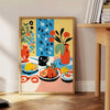 Abstract kitchen scene with orange and blue tones - beside a round wooden side table with books
