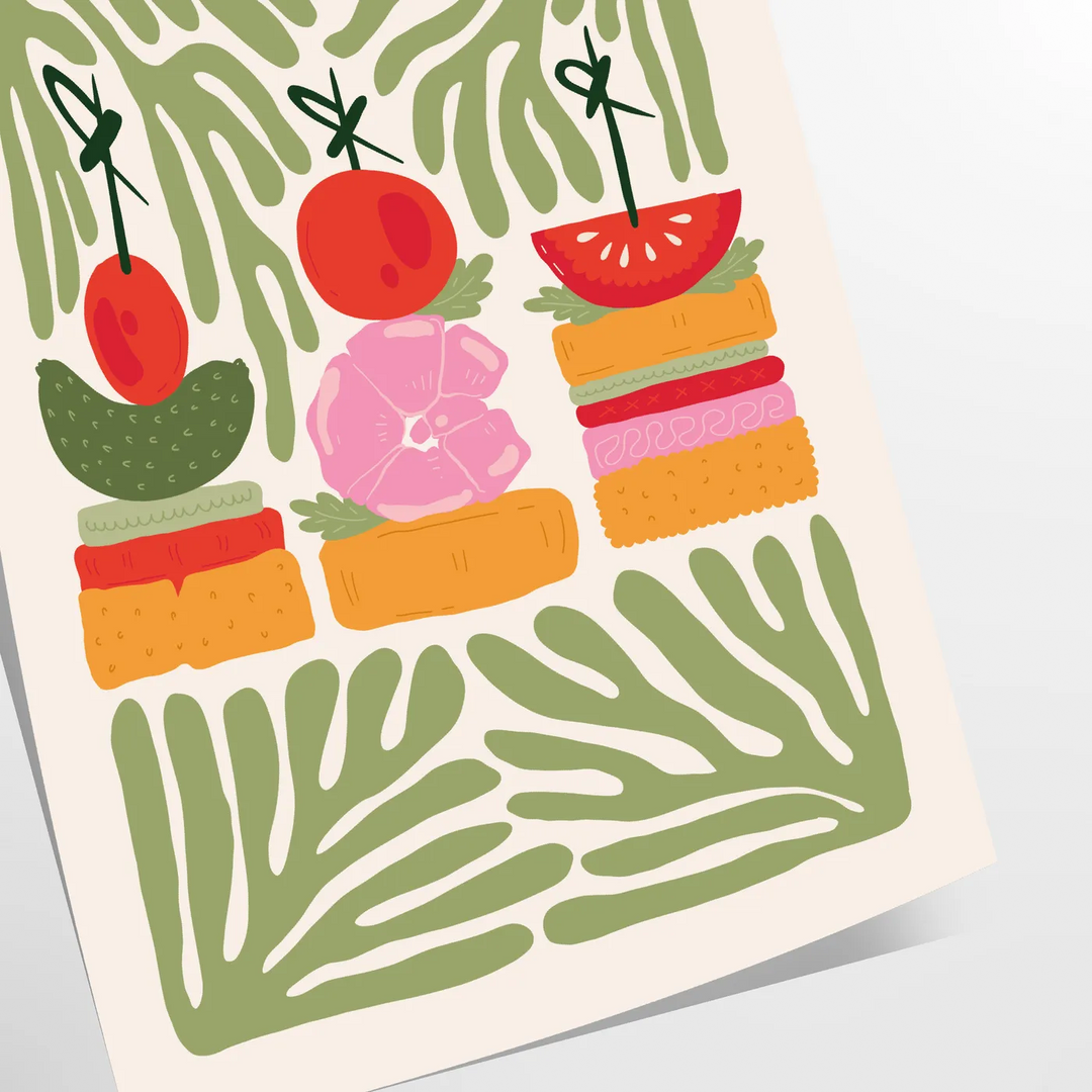 A colorful kitchen print featuring shades of green and orange
