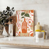 Contemporary kitchen scene with bold orange and gray tones - styled on a counter with eucalyptus and a bowl of lemons