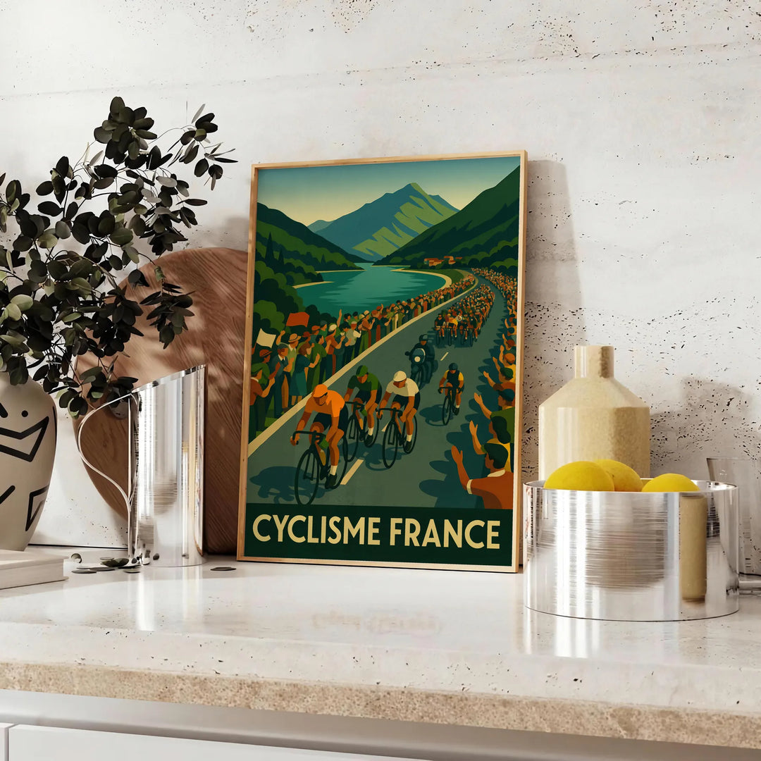 Tour de France cycling poster with minimalist gray and green illustration - styled on a counter with eucalyptus and a bowl of lemons