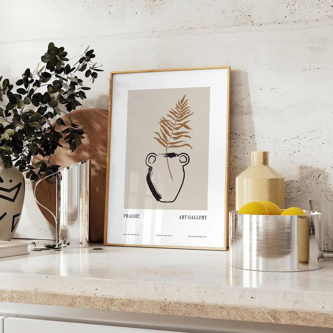 Colorful boho poster featuring abstract shapes and patterns in green and black - styled on a counter with eucalyptus and a bowl of lemons