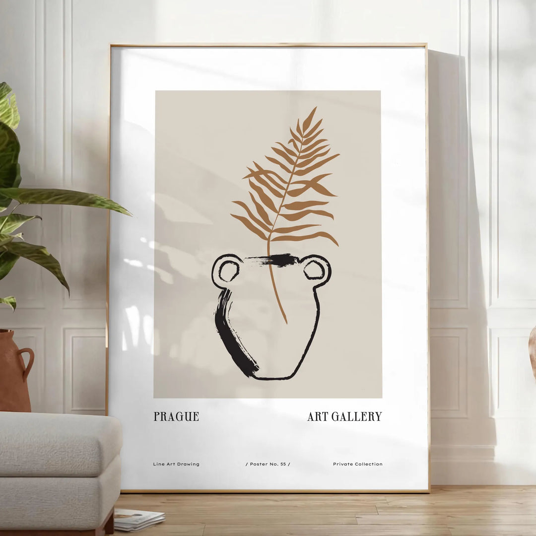 Colorful boho poster featuring abstract shapes and patterns in green and black - in a bright minimalist room with a plant and an armchair