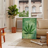A detailed illustration of green leaves against a gray background - in a Parisian living room with a sofa and a fig plant