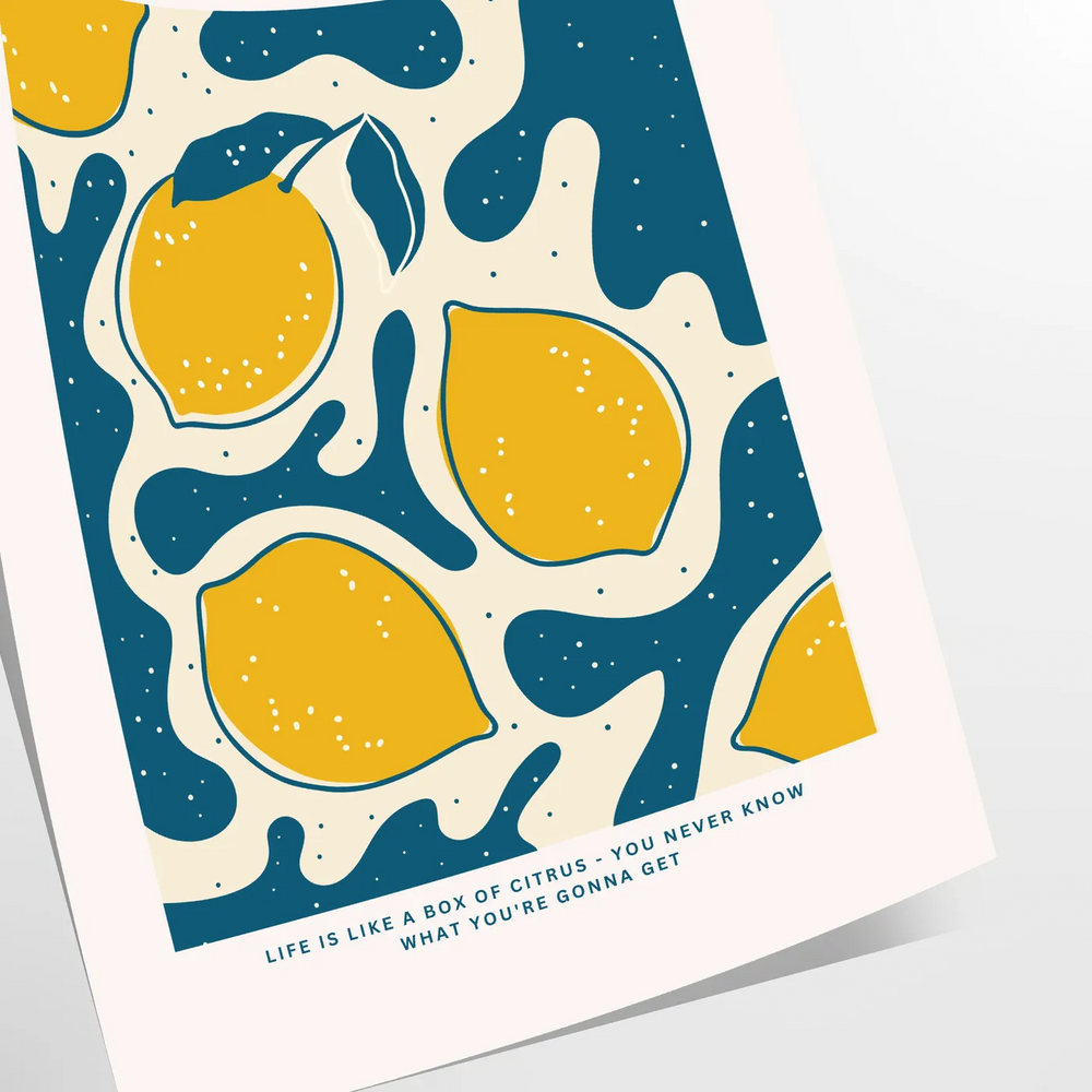 A bright lemon illustration on a gray background with orange accents