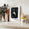 Maximalist poster featuring abstract space elements in black and blue tones - styled on a counter with eucalyptus and a bowl of lemons