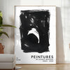 Maximalist poster featuring abstract space elements in black and blue tones - in a bright minimalist room with a plant and an armchair
