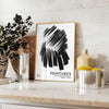 Maximalist wall art featuring bold black and blue hues - styled on a counter with eucalyptus and a bowl of lemons