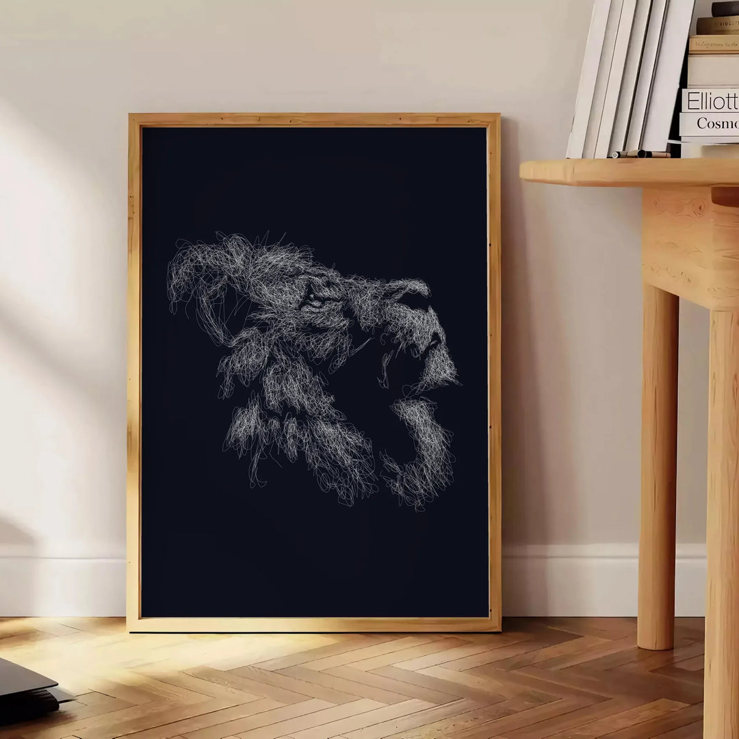 A black lion's head with green accents in a bold, modern style - beside a round wooden side table with books