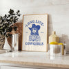 Illustration of a cowgirl in a gray and white Wild West setting - styled on a counter with eucalyptus and a bowl of lemons