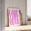 Abstract design featuring pink and purple hues with motivational text - leaning on a herringbone floor against a white panelled wall