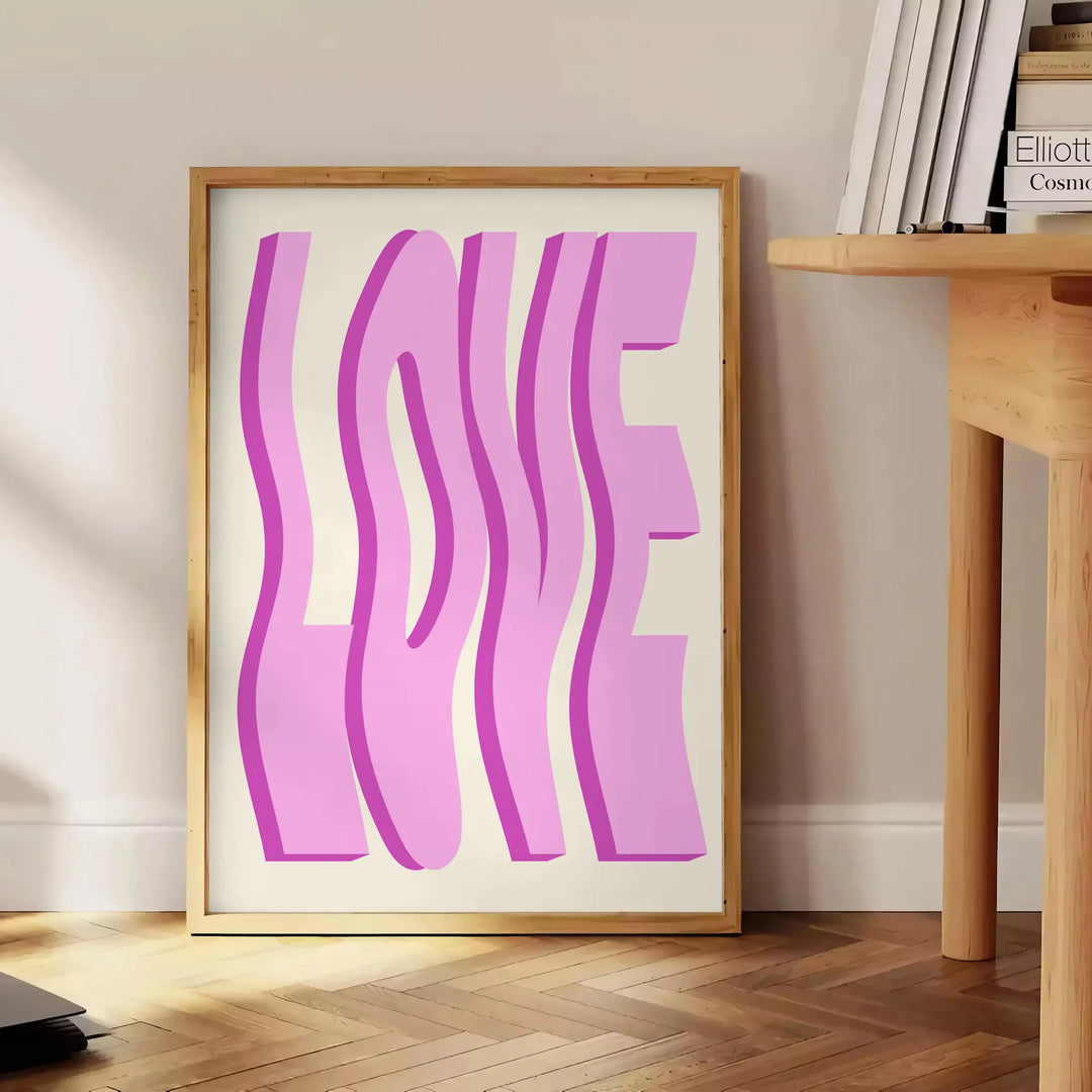 Abstract design featuring pink and purple hues with motivational text - beside a round wooden side table with books