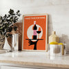 Cocktail-themed artwork featuring wine glasses in a minimalist style with black and brown tones - styled on a counter with eucalyptus and a bowl of lemons