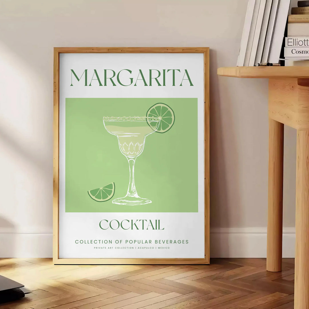 Uma ilustração colorida de um coquetel margarita com tons verdes e brancos - ao lado de uma mesa de apoio redonda em madeira com livros
