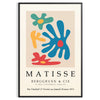 Abstract cut-out design in white and yellow by Matisse - in a black frame
