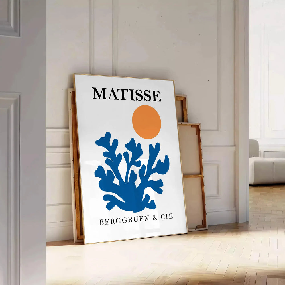 Matisse cut-paper style poster showing abstract black and orange shapes