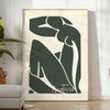Gray and white poster of Matisse paper cut abstract shapes, minimalist. - in a bright minimalist room with a plant and an armchair
