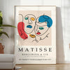 Abstract cut-paper composition in white and yellow by Matisse - in a bright minimalist room with a plant and an armchair