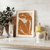 Colorful abstract cut-out shapes in the style of Matisse - styled on a counter with eucalyptus and a bowl of lemons