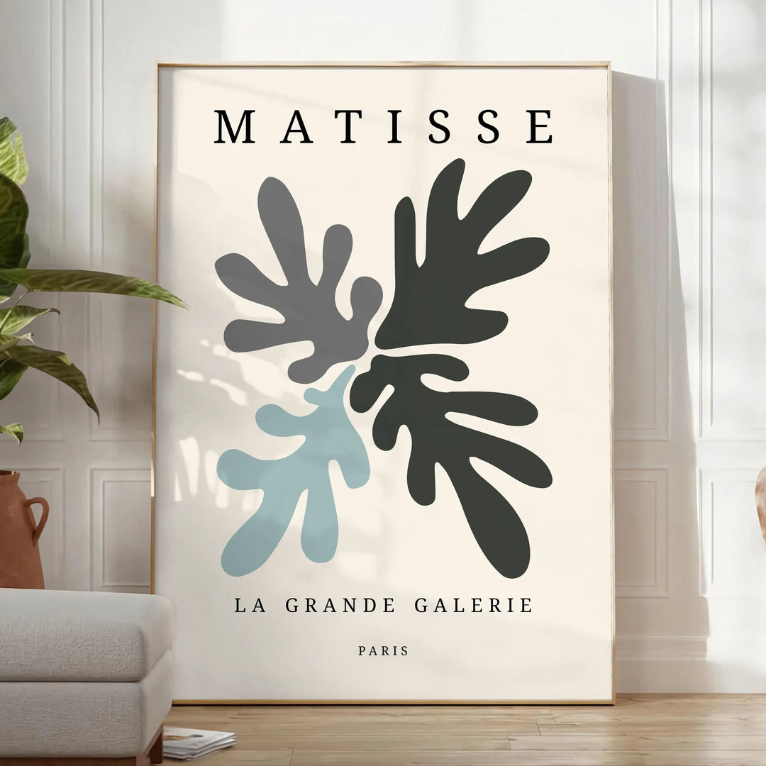 Gray and white Matisse papier découpé abstract poster in modern style. - in a bright minimalist room with a plant and an armchair