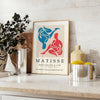 Colorful abstract cut-out shapes in the style of Matisse - styled on a counter with eucalyptus and a bowl of lemons