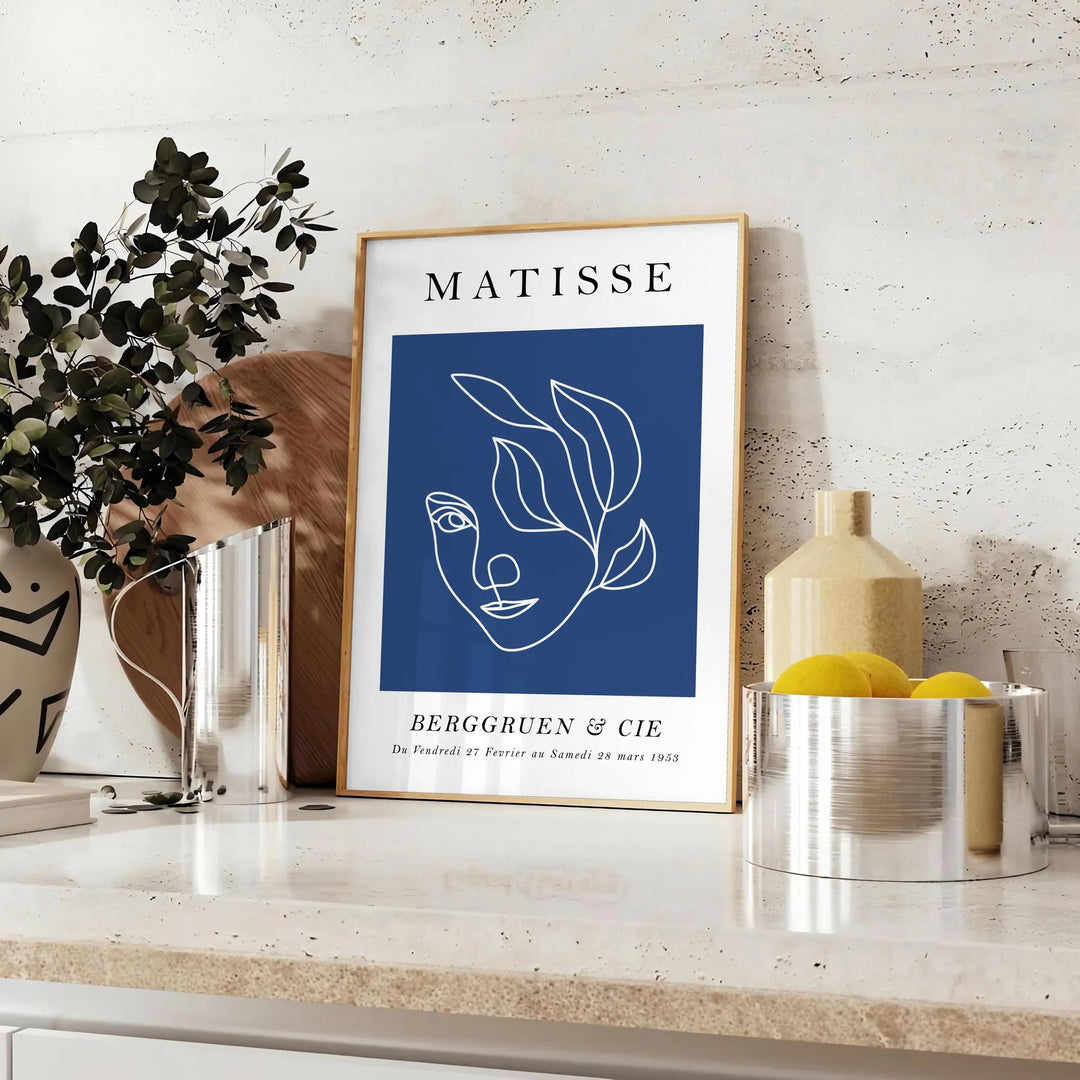 Black and white Matisse cut-outs poster, abstract papier découpés artwork - styled on a counter with eucalyptus and a bowl of lemons