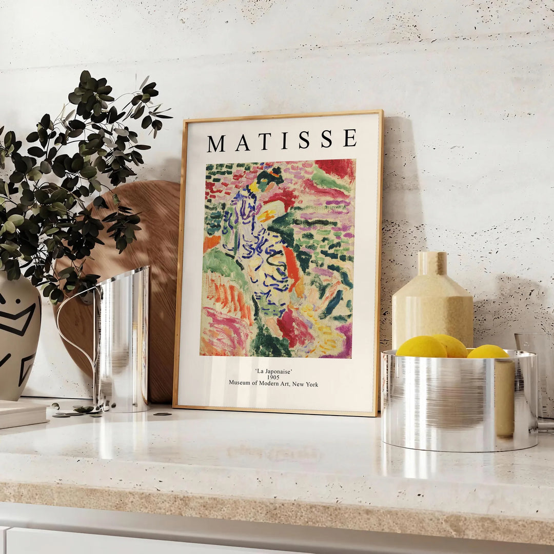 Abstract composition with bold colors and shapes inspired by Matisse - styled on a counter with eucalyptus and a bowl of lemons