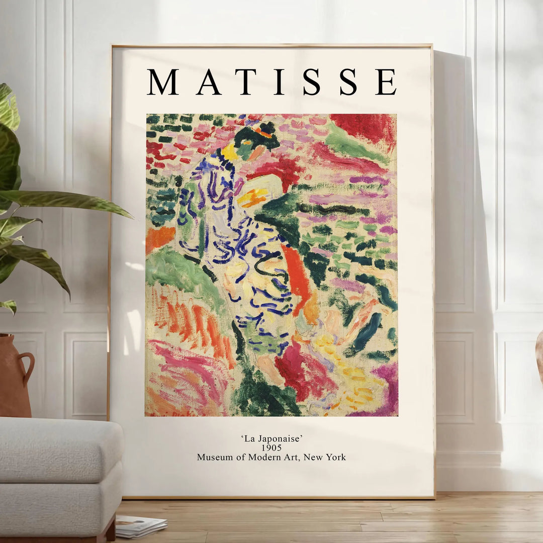 Abstract composition with bold colors and shapes inspired by Matisse - in a bright minimalist room with a plant and an armchair